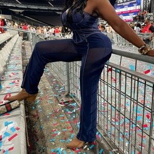 Blue Jean jumpsuit (pants legs are sheer) worn once